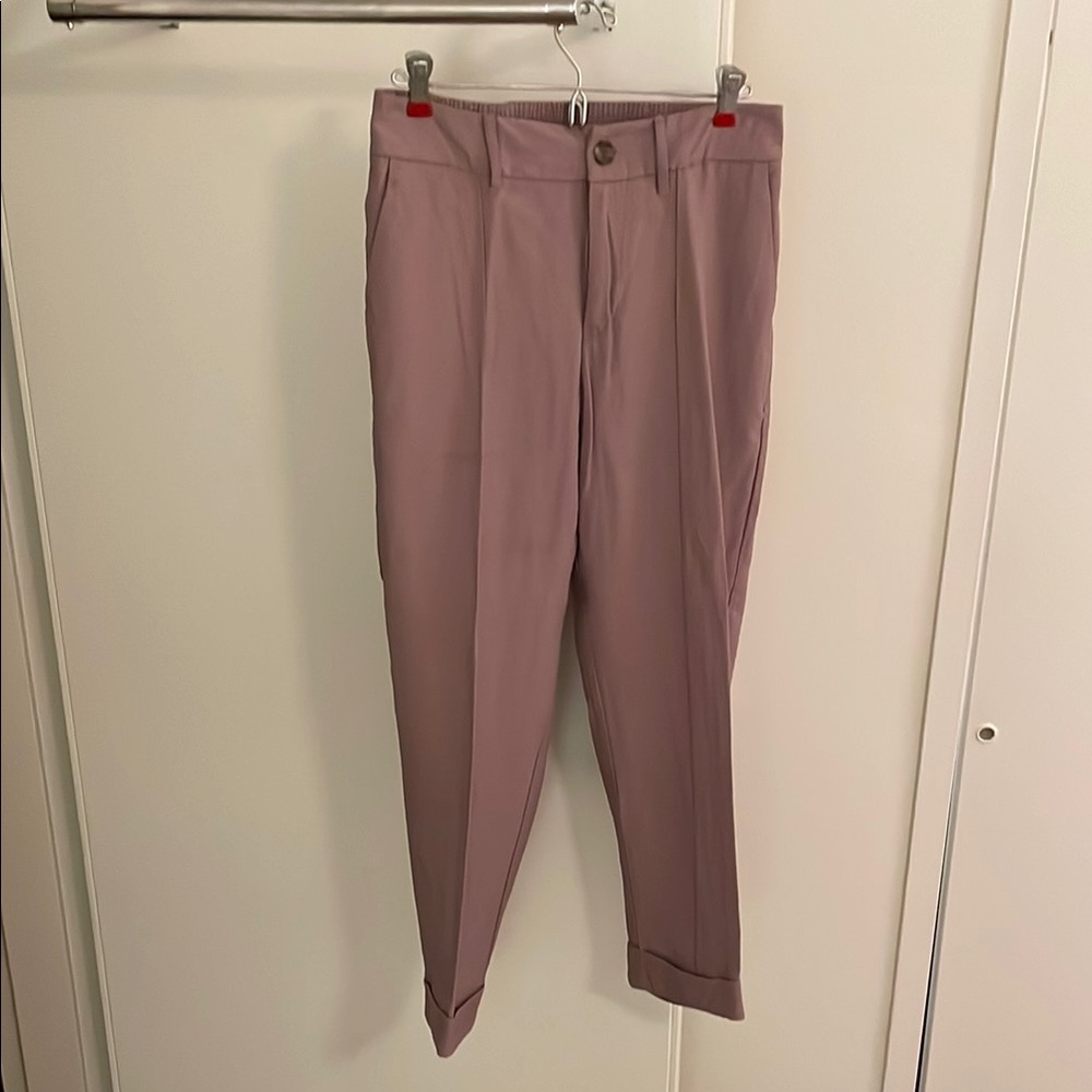 Pleated, cuffed, and lilac women’s pant.